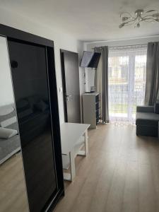 Postel nebo postele na pokoji v ubytování Nad Stawem I i II