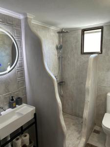 A bathroom at ''Mary's House'' Entire residence Olympiada Halkidiki Near to Sea 200m !
