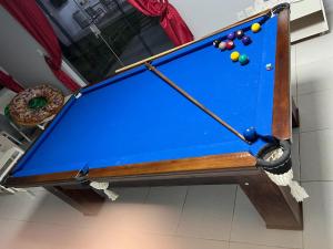 a pool table with a in a room at Sonho de Verão in Paripueira +6 photos