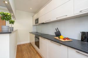 Η κουζίνα ή μικρή κουζίνα στο Green Park Apartments +25 φωτογραφίες