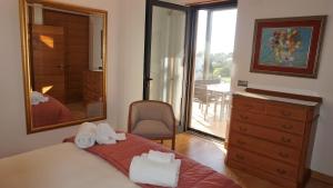 Ένα ή περισσότερα κρεβάτια σε δωμάτιο στο Luxury 3 Bedroom, 3 ensuits, Private pool, Vale do Lobo +50 φωτογραφίες