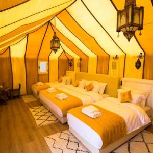Postel nebo postele na pokoji v ubytování Luxury Trippers Camp