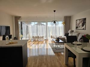 a living room with a couch and a table at Apartment Bella in Prelog