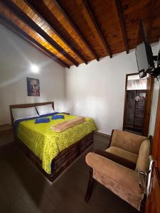 Postel nebo postele na pokoji v ubytování Hotel Olímpica