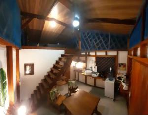 Predel za sedenje v nastanitvi La Casita Cozy Beachfront Cottage with Shared Pool Access