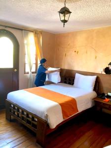 Letto o letti in una camera di Kituandes Hotel