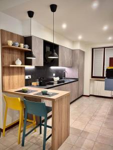 Kuchyň nebo kuchyňský kout v ubytování La corte Apartment-Verona & Lake