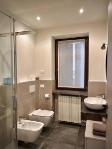 Koupelna v ubytování La corte Apartment-Verona & Lake + 17 fotografií