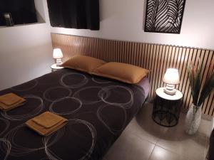 Postel nebo postele na pokoji v ubytování charmant gite 25m² indépendant