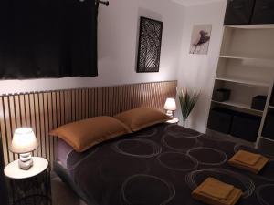 Postel nebo postele na pokoji v ubytování charmant gite 25m² indépendant