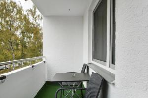 Un balcon sau o terasă la Modern Apartments Neuburg O - NEU - 2 Zimmer, Komfort, Top Ausgestattet, Smart TV, Wi-Fi