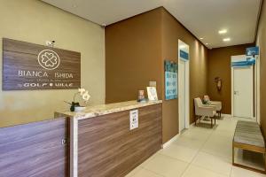 lobby szpitala z recepcją w obiekcie Golf Ville Térreo 3 Suítes 8 Pessoas w mieście Berra Bode +72 zdjęcia