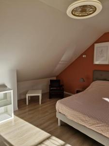 Postel nebo postele na pokoji v ubytování cocon d'Eden