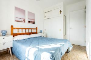 Turquoise Menorca By the Sea客房内的一张或多张床位