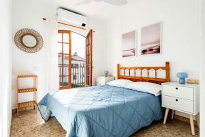 Turquoise Menorca By the Sea客房内的一张或多张床位