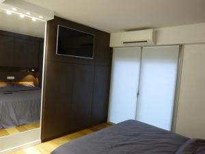 Posteľ alebo postele v izbe v ubytovaní Appartement Standing à Toulouse en centre ville