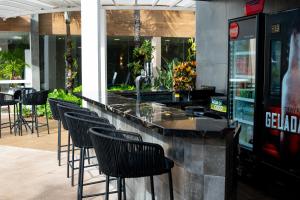 Um restaurante ou outro lugar para comer em Nadai Confort Hotel e Spa