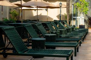 Uma área de estar em Nadai Confort Hotel e Spa