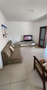 Et opholdsområde på Aconchego Próximo ao Mar