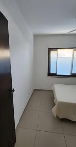 Et badeværelse på Aconchego Próximo ao Mar