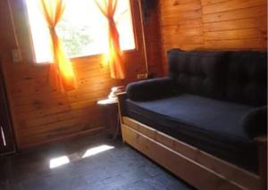 Et opholdsområde på Cabaña para 4 pax