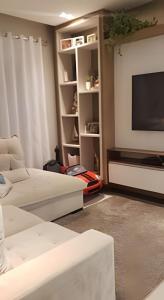 Et tv og/eller underholdning på Aconchego para Famílias