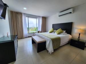 Postel nebo postele na pokoji v ubytování Hotel Anaconda