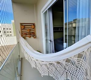 En balkon eller terrasse på Aconchego para Famílias