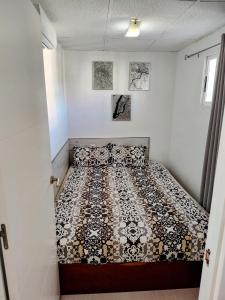 A bed or beds in a room at Apartamento Gasparot