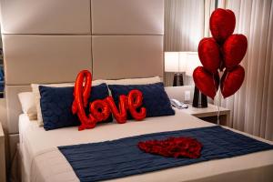 Cama ou camas em um quarto em Nadai Confort Hotel e Spa