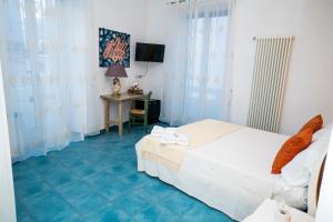Voodi või voodid majutusasutuse Casa Junno toas