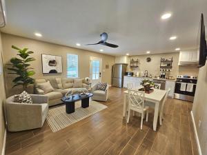 a living room with a couch and a table at Belton Lakehouse in Belton