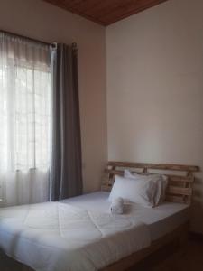 Ένα ή περισσότερα κρεβάτια σε δωμάτιο στο Miroshi Camp Site +11 φωτογραφίες