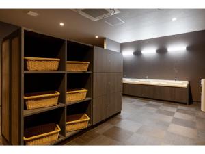 a room with wooden shelves and a bath tub at Hotel Taiyo Noen Saijo - Vacation STAY 26756v in Saijo +31 photos