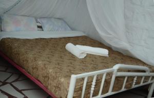 Postel nebo postele na pokoji v ubytování SOFA CAMP Naivasha