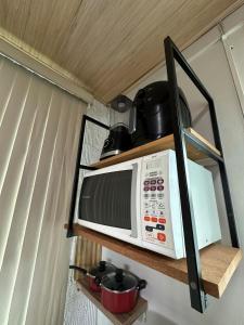 Köök või kööginurk majutusasutuses LOFT Completo - próximo ao Centro com Ar Condicionado
