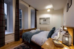 Ένα ή περισσότερα κρεβάτια σε δωμάτιο στο Noble Apartment - Highland Club +46 φωτογραφίες