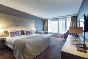 Postel nebo postele na pokoji v ubytování Van der Valk Hotel Haarlem