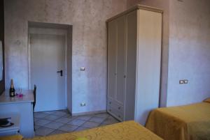 Ένα ή περισσότερα κρεβάτια σε δωμάτιο στο Hotel Antico Distretto