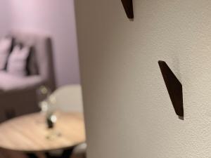 a close up of a door with a bedroom in the background at Fächerlofts Black Forest Terrasse 40qm Studio WLAN - Messe Karlsruhe in Durmersheim