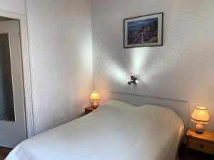 Posteľ alebo postele v izbe v ubytovaní Résidence Héliovillage - Villa 3 pers. T2 Cap d'Agde MAE-2864