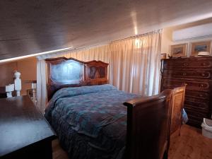 Postel nebo postele na pokoji v ubytování Luciano e Concetta