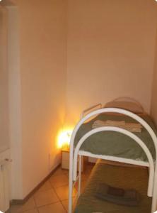 Postel nebo postele na pokoji v ubytování Le Chic 2 Vanzago