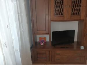 TV a/nebo společenská místnost v ubytování Le Chic 2 Vanzago
