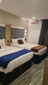 Fotografie z fotogalerie ubytování Immaculate Hotels and Apartments v Asabě