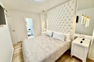 A bed or beds in a room at MARBELLA ALICATE BEACHFRONT - Luxury Apartment-2
