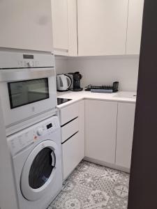 A kitchen or kitchenette at Old Town, City Center Apartment Premium with PARKING