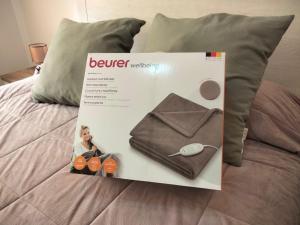 Łóżko lub łóżka w pokoju w obiekcie APARTAMENTOS La PEÑA C