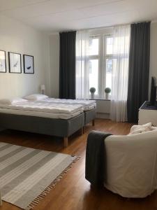 Postel nebo postele na pokoji v ubytování CentRum Turistlogi