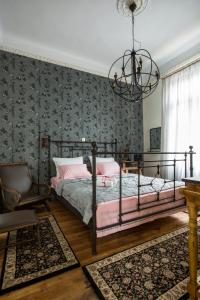 Tempat tidur dalam kamar di Classic Villas Ouziel